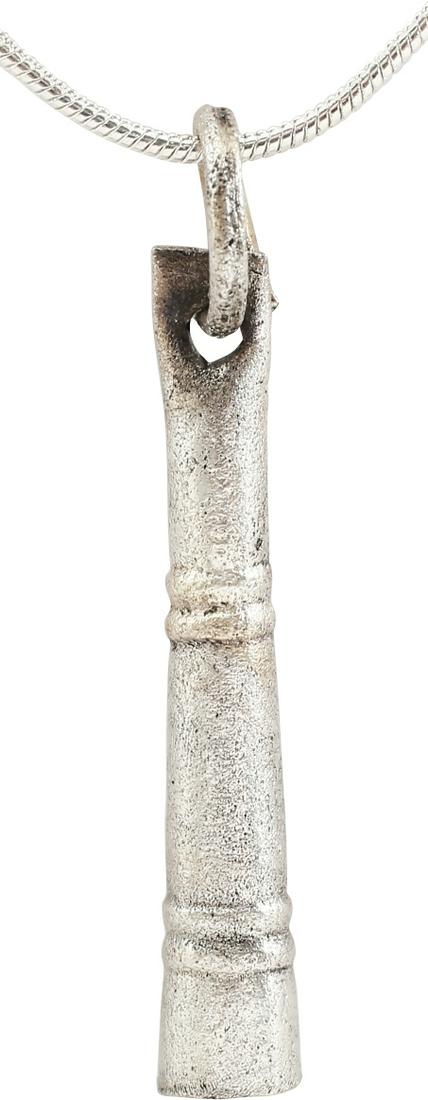 VIKING TUBULAR PENDANT NECKLACE, 9TH-11TH CENTURY AD: Over 1 3/8" length, of elegantly tapered cylindrical form with double raised rounded rings and pierced shaped terminal. Open butted at the back. With its original suspension ring with the ends overlap