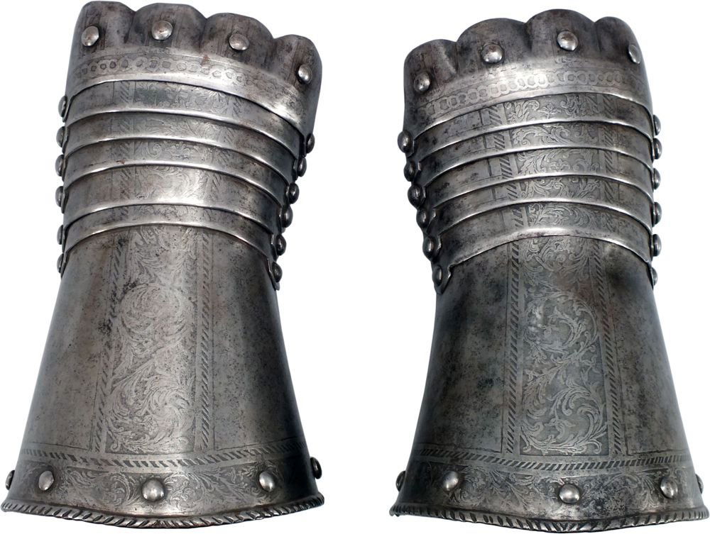 PAIR OF GERMAN ARMOR GAUNTLETS C.1580-90: Iron with rolled and roped edge cuffs, five metacarpal plates and shaped knuckle plates. Finely etched with central bands of foliage and foliage upper borders. Finger and thumb plates lacking.