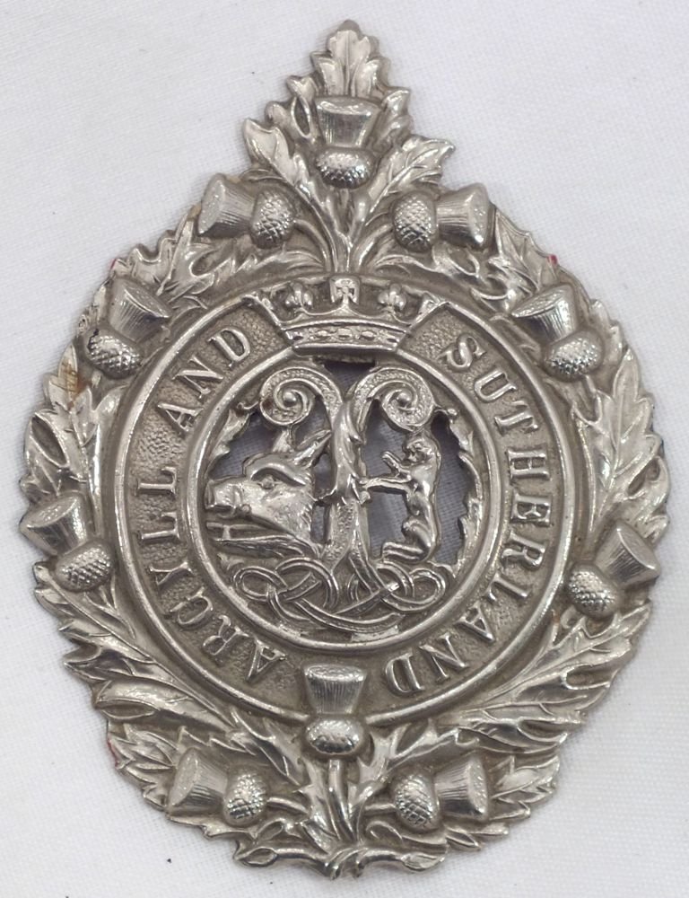 SCOTTISH AND ENGLISH HAT BADGES: Argyll and Sutherland and East Yorkshire. Both with back pins removed.
