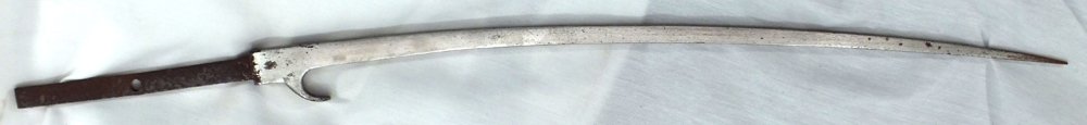 JAPANESE SAMURAI HELMET BREAKER HACHAWARI: Edo period. Iron, 18 1/2" total length. Curved diamond section blade with base hook. Tang pierced with a single mounting hole.