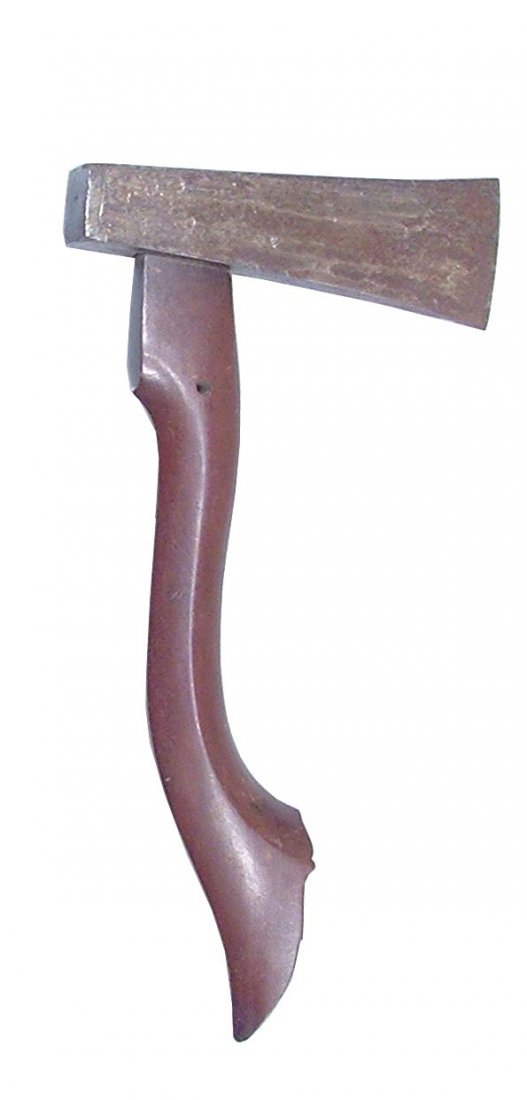 ANTIQUE BATAK INDONESIA HATCHET OR SMALL AXE: Used both as a tool and weapon. Beautifully formed dark wood haft with flared stepped terminal and thickened fore end pierced for a wrist thong. The iron head of deeply grained (pamir) laminated iron,
