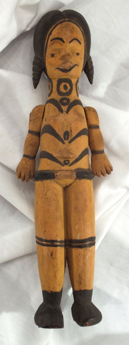 FINE IBO FEMALE FIGURE EX. CHRISTIES LONDON: 14 1/2" height. Beautifully modeled, the face with pronounced nose and lips, high brow and side braided hair. The arms separate with spread finger hands facing to the back t and pivoting on iron nails