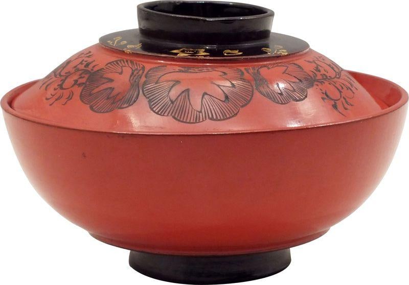 JAPANESE LACQUERED COVERED BOWL: Meiji Period, 1867-1912. 4 3/4" diameter. Rounded with short steps to the top and bottom. Cylindrical foot and grip. Orange body color with black circular panel to the top and bottom. The top with gol