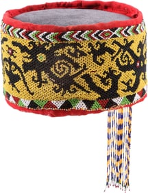 FINE AND RARE DAYAK HEADHUNTER'S BEADED HEADDRESS