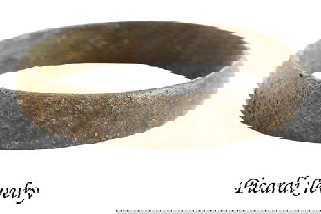 RARE COPPER VIKING WEDDING RING, 900-1050 AD, SIZE 10 ½: Size 10 &frac12;. 4.0mm width with rounded face. Made with a central core to distribute the molten metal and heat. The core was then laboriously removed by hand with the remnants still visible. Except