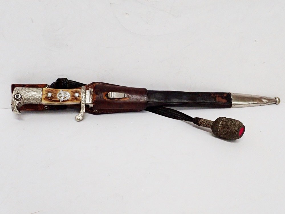 WWII German Police Baynonet w/ Scabbard and Knot. S. Op: Title:WWII German Police Baynonet w/ Scabbard and Knot. S. Op. II. 49.Description: WWII German Police Baynonet w/ Scabbard and Knot. S. Op. II. 49. This bayonet has stag grip with eagle head and oak l