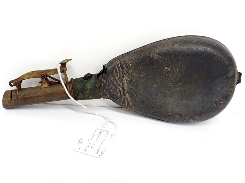 Pre-Civil War James Dixon & Sons Gun Powder Flask: Title:Pre-Civil War James Dixon & Sons Gun Powder FlaskDescription: Pre-Civil War James Dixon & Sons Gun Powder Flask. Metal and leather are in two parts as they do not stay together. Leather is distr