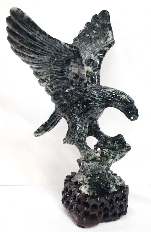 Antique Chinese Nephrite Jade Carved Eagle Statue: An exquisite antique Chinese carved black and white mottled nephrite jade eagle sculpture or statue with stunning color an magnificent detail. Includes custom wooden base. 14.5in height x 11.5in width