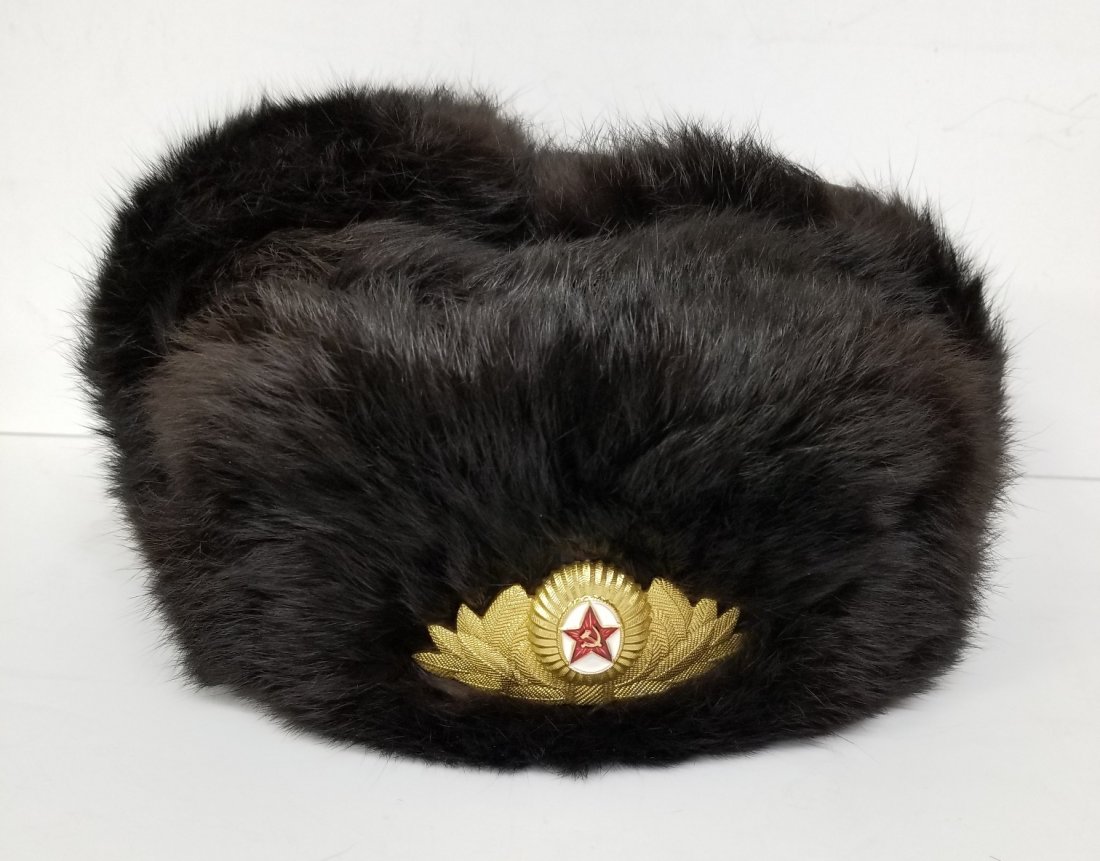 Russian Soviet Union Winter Hat Ushanka Fur Dark Brown: Russian Soviet Union Winter Hat Ushanka Fur Dark BrownDescription:Up for auction is a Russian Soviet Union Winter Hat Ushanka Fur Dark Brown. We believe the hat is made of artificial fur. Still has or