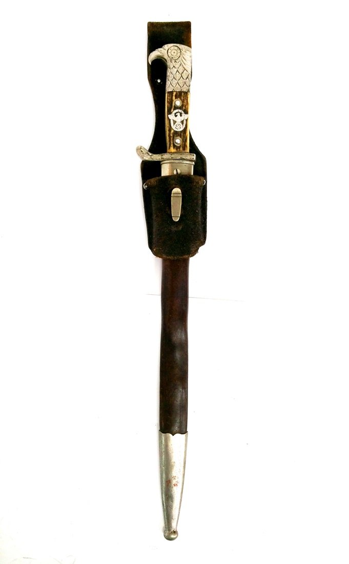 WWII Nazi Stag Horn Dress Knife Dagger Knife: Title:WWII Nazi Stag Horn Dress Knife Dagger KnifeDescription:Carved stag horn handle, with eagle décor on the butt, with leather holder. Type of Piece:KnifeCondition:Pre-Owned Approx Dimensions or S