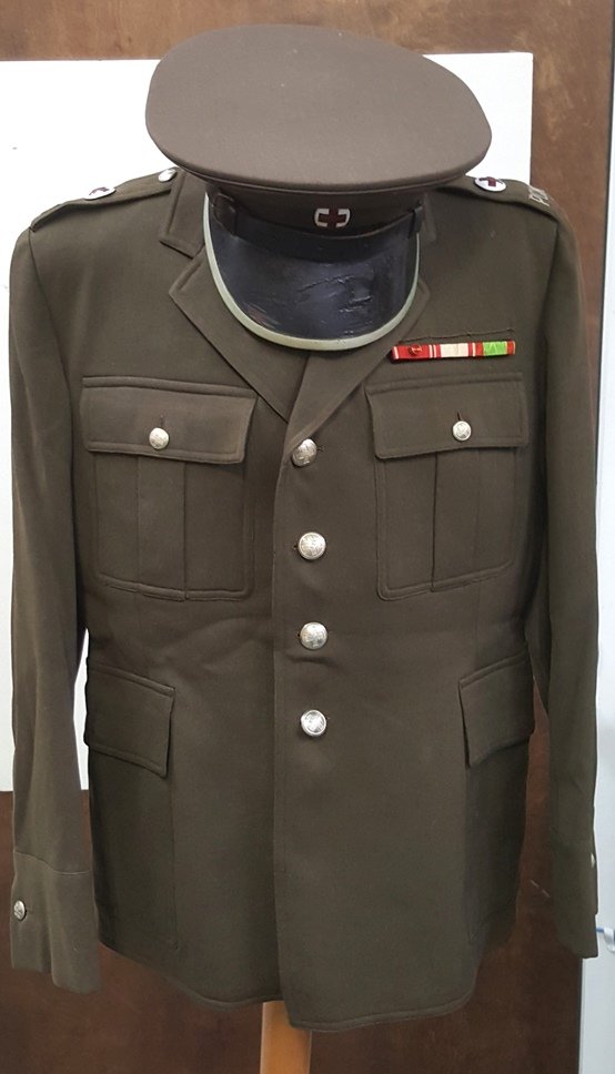 Vintage Polish Red Cross Dress Uniform Hat Jacket: Title:Vintage Polish Red Cross Dress Uniform Hat JacketDescription:Offering a vintage Polish Red Cross dress uniform with jacket and hat. Our auction estimate on this piece is 10-10000. CNX 1051 3656T