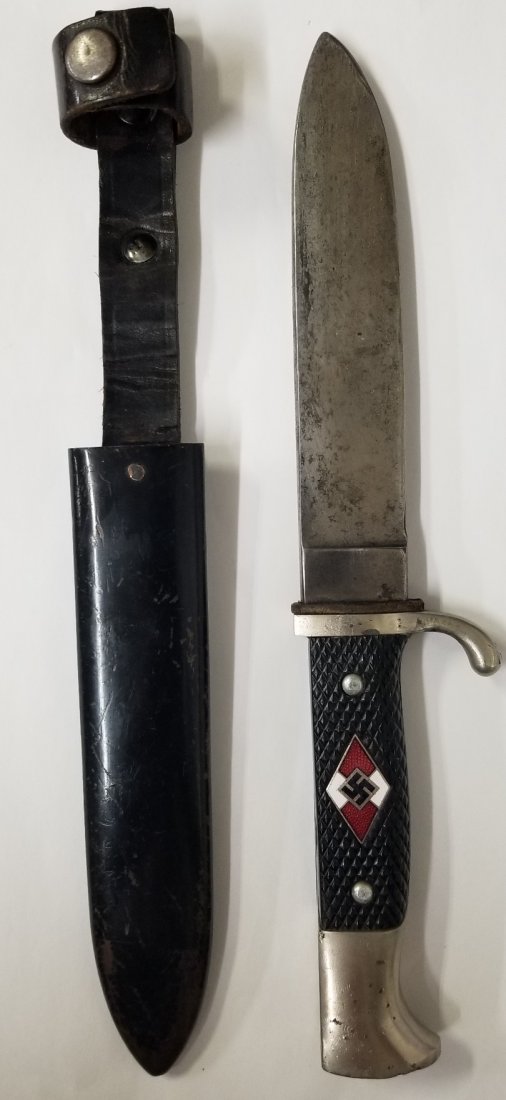 WWII SS Nazi Youth Germany Military dagger knife: WWII SS Nazi Germany Military Schneidteufel Solingen Dagger Knife w ScabbardDescription:Up for auction is a WWII SS Nazi Germany Military Schneidteufel Solingen Dagger Knife w Scabbard. Inscribed on t