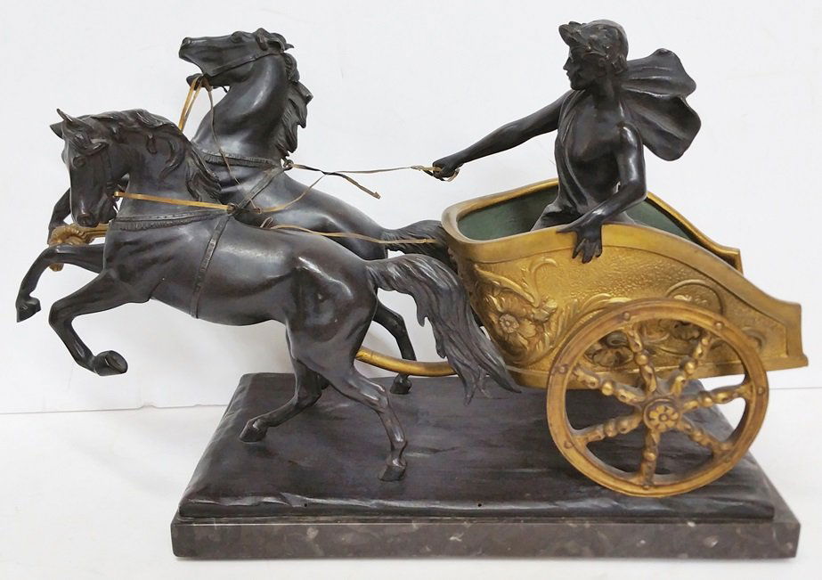 Antique Grand Tour Bronze Chariot Signed Montini: Antique Grand Tour Bronze Chariot Signed Montini. 15.5 inches longest length. Displays surface wear, dusty, some rubs present, the horses and the chariot wheels are a bit loose but secure, the reins a