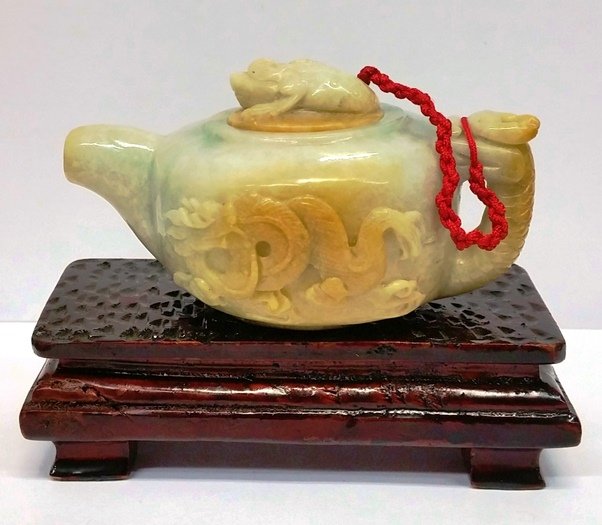 Chinese Jadeite Jade Rust Green Miniature Tea Pot: Described By:Nikki HFA CNX JH 001 Title:Vintage Chinese Jadeite Jade Rust To Green Miniature Teapot Wooden BaseDescription:A beautiful vintage Chinese rust to green jadeite jade miniature teapot with 
