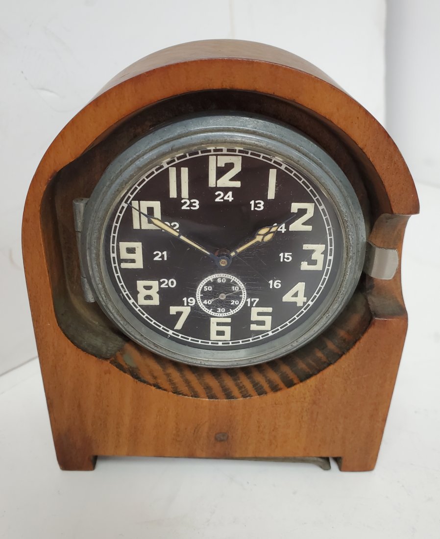 German Back Wind Army Radio Room Clock 1943 WWII: Title: German Back Wind Army Radio Room Clock 1943 8 Day Kienzle 2390 WWII Description: Up for auction is a WWII German Kienzle army radio room clock. The clock is running strong, but may need a servi