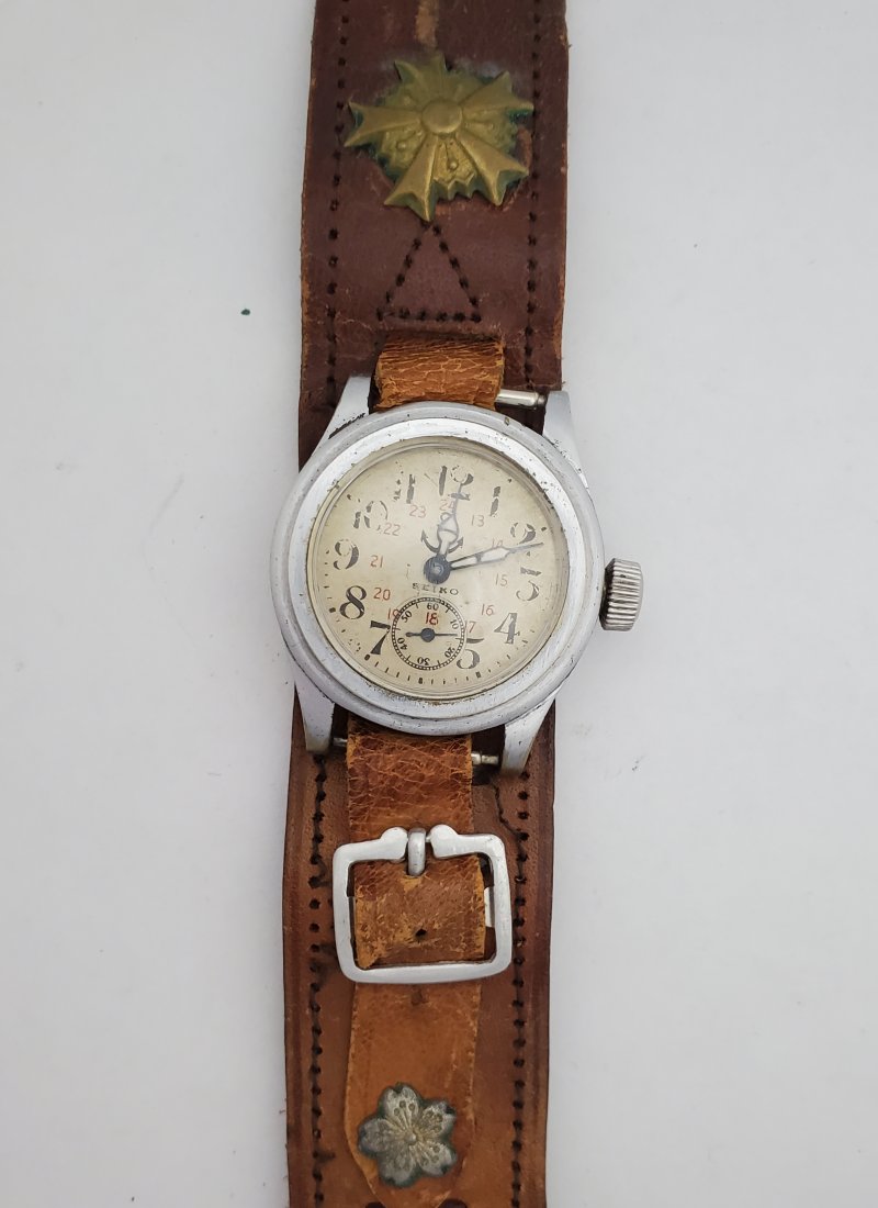 Japanese Seiko Seikosha Calatrava Style Naval Watch: Title: Japanese Seiko Seikosha Calatrava Style Naval Anchor Dial Wrist Watch Description: Up for auction is a very cool Seiko/Seikosha calatrava-style naval wrist watch. It comes on a leather strap wi