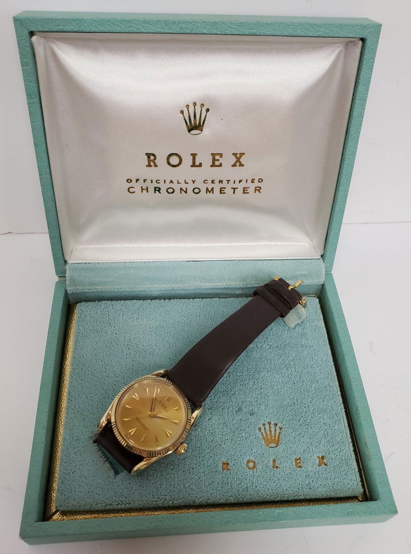 Rare Rolex Bombe 14k Gold 1011 W/ Box+Papers: Title: Rare Rolex Bombe 14k Gold 1011 W/ Box+Papers Description: Up for auction is a beautiful rare vintage Rolex Bombe 14k gold case ref. no. 1011. This watch is running and in good condition. It com