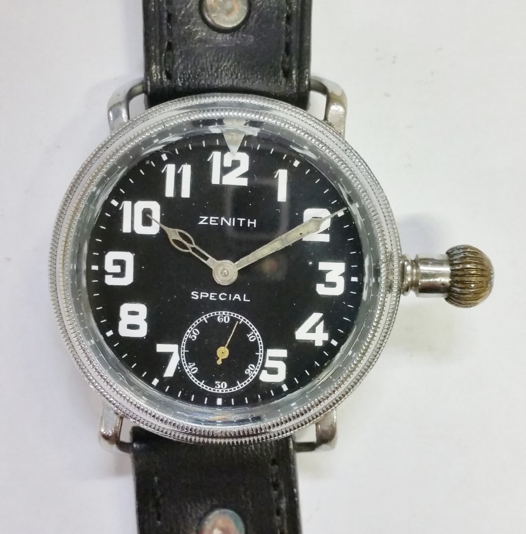 Zenith Mint Movement Glass Back Military Wrist Watch: Title: Giant Zenith Mint Movement Glass Covered Back Military Wrist Watch Description: A very large wrist watch by the Swiss watch company Zenith. It has an amazing movement and a glass cuvet with lea