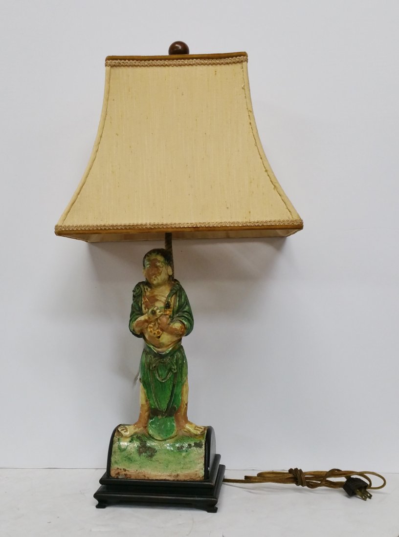 Antique Chinese Qing Sancai Roof Tile Immortal Lamp: Described By:Nikki HFA VX NMYI Title:Antique Chinese Qing Sancai Roof Tile Immortal Guardian Statue Lamp Description: Interesting antique Chinese Qing era Sancai roof tile immortal guardian statue lam