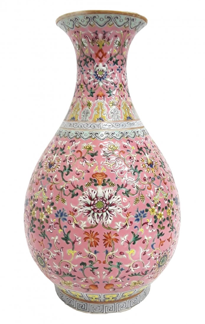 Chinese Famille Rose Jaune Vase: Described by: Rachel CNX 1211 4985 Title: Chinese Famille Rose Jaune Signed Floral Porcelain Vase Description: A very intricate and delicate floral pattern covers the whole vase. Size in inches: