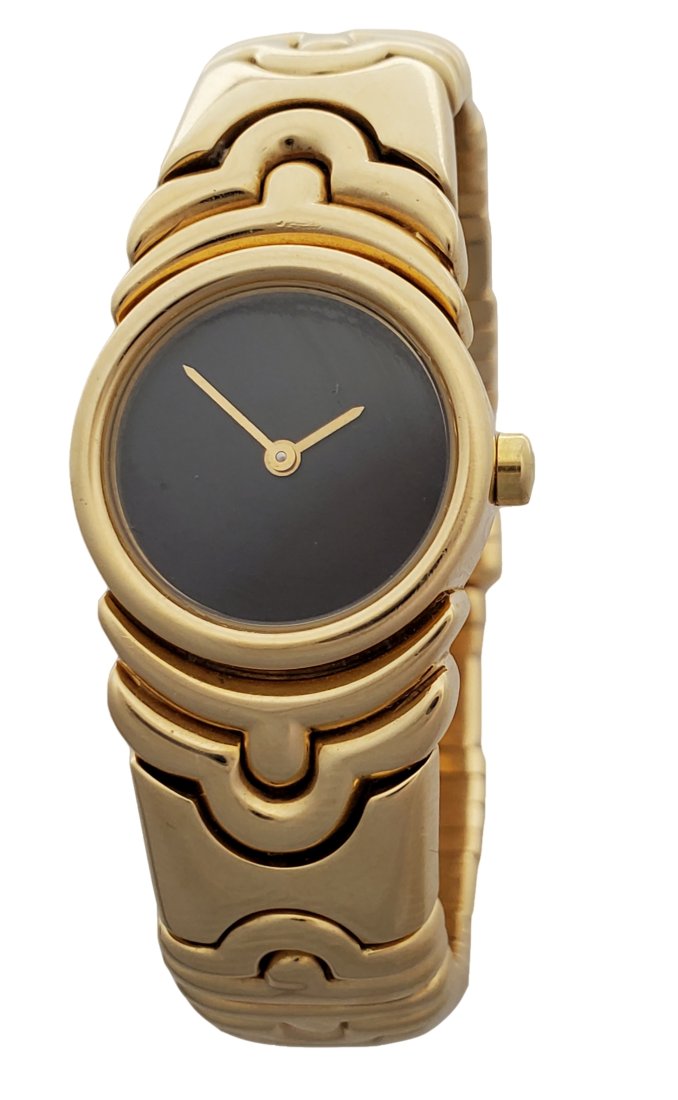 18k Gold Bulgari Bvlgari Heavy Working Ladies Wrist Watch: Title:18k Gold Bulgari Bvlgari Heavy Working Ladies Wrist Watch Description: 18k Gold Bulgari Bvlgari Heavy Working Ladies Wrist Watch Case Size:20mm diameter Total Length:5.25 inches, please note