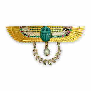 18K Yellow Gold Vintage Egyptian Revival Winged Scarab Multi Gemstone Brooch: Title: 18K Yellow Gold Vintage Egyptian Revival Winged Scarab Multi Gemstone Brooch Description:An Egyptian ceramic scarab is surrounded by large gold wings expertly crafted and studded with natural e