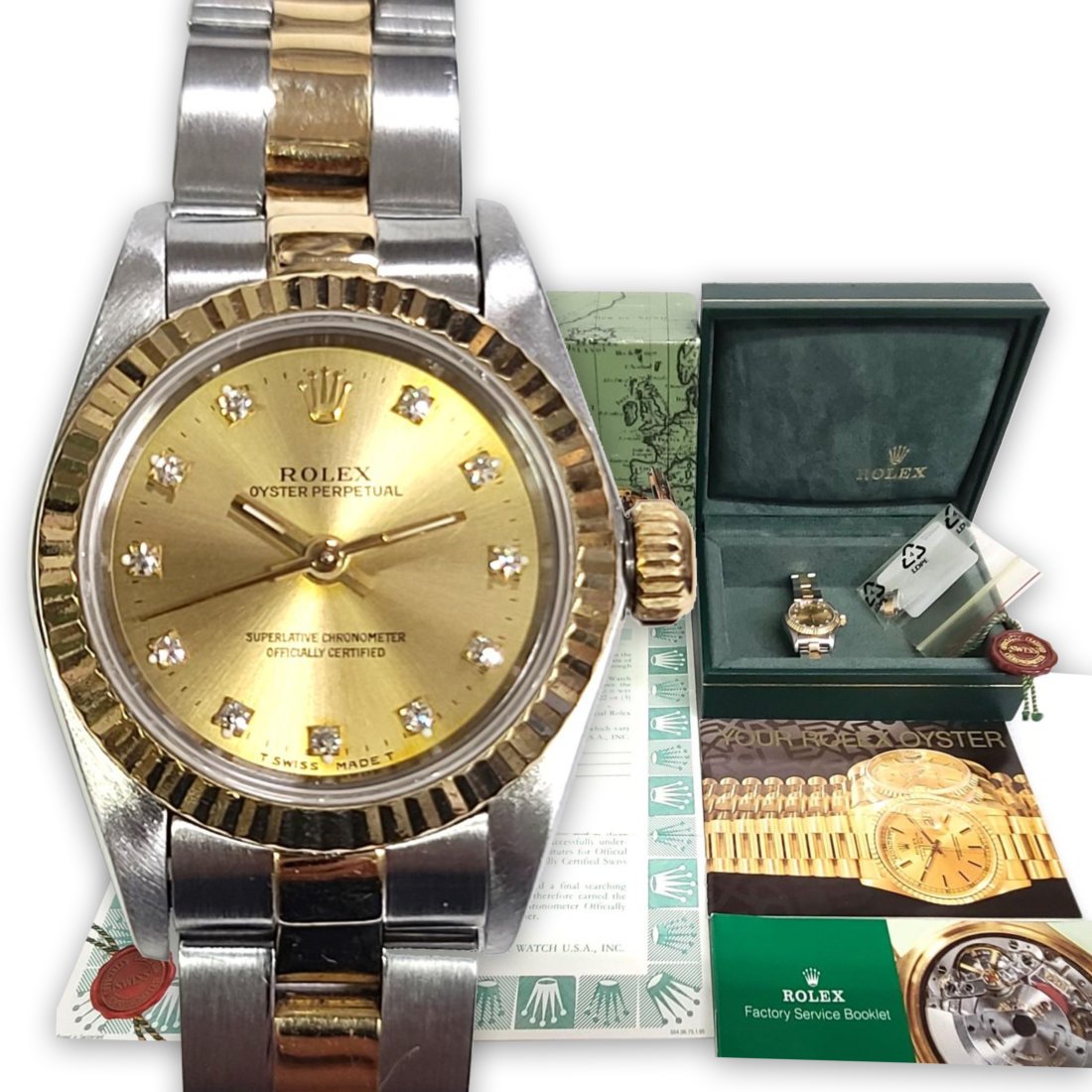 Rolex 67193 18K Gold SS Diamond Champagne Serti Dial Ladies Watch Box Papers Tag: Described By:Robin NODDD 45161 Description: • Description: Rolex 67193 18K Gold SS Diamond Champagne Serti Dial Ladies Watch Box Papers Tag. • Circa: 1993• Serial Number: S683238 •