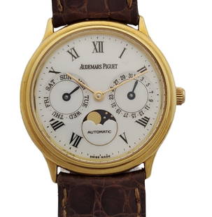 Audemars Piguet 18k Gold Moonphase Triple Calendar 33mm Watch: Described By:Michelle CNX 1488 7688 Title:Audemars Piguet 18k Gold Moonphase Triple Calendar 33mm Watch Description: Audemars Piguet 18k Gold Moonphase Triple Calendar 33mm Watch Case Size:33m dia