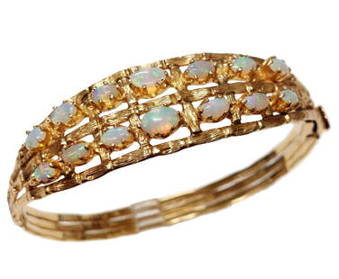 Natural Australian Opal 14k Gold Bamboo Motif Midcentury Hinged Bangle Bracelet 6.5 inch: Title: Natural Australian Opal 14k Gold Bamboo Motif Midcentury Hinged Bangle Bracelet 6.5 inch Description: Classic midcentury oval hinged bangle made in solid 14k gold & set across the top with natu