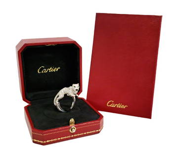 Rare Cartier Panther Diamond Emerald Onyx 18k White Gold Ring w Box and Papers: Title:Cartier Panthere De Cartier Diamond Emerald Onyx 18k White Gold w/ Orig Box and Papers Description: Cartier signed and numbered rare panther ring. Set in 18k white gold. This approx. 3.30ctw ful
