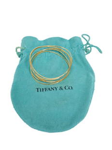 Tiffany & Co Elsa Peretti 18K Gold 5 Piece Wave Bangle Bracelet With Pouch: Title: Tiffany & Co Elsa Peretti 18K Gold 5 Piece Wave Bangle Bracelet With Pouch Description: Tiffany & Co Elsa Peretti 18K Gold 5 Piece Wave Bangle Bracelet With Pouch. Fits 7.5in Wrist. Gold Shows