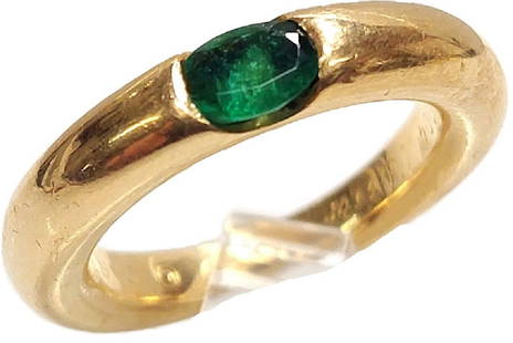 Vintage Cartier Ellipse Natural Emerald 1992 18K Gold Band Ring With Papers: Title: Vintage Cartier Ellipse Natural Emerald 1992 18K Gold Band Ring With Papers Description:A stunning natural emerald set in 18K gold with original papers. Vintage Cartier Ellipse Natural Emerald