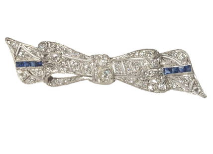 Art Deco Approx 2.50ctw Old Cut Diamonds Platinum Filigree Ribbon Bow Brooch w/ Scissor Cut Blue Sap: Title: Art Deco Approx 2.50ctw Old Cut Diamonds Platinum Filigree Ribbon Bow Brooch w/ Scissor Cut Blue Sapphire Accents Description: A genuine Art Deco platinum filigree brooch that is encrusted wit