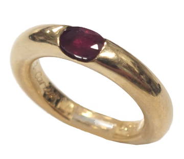 Cartier 18k Gold Ruby Ellipse Band Ring Signed & Numbered w/ Original Papers: Title: Cartier 18k Gold Ruby Ellipse Band Ring Signed & Numbered w/ Original Papers Description: The quintessential 18k gold band style ring set with a fine 0.50ct natural ruby, properly signed & numb
