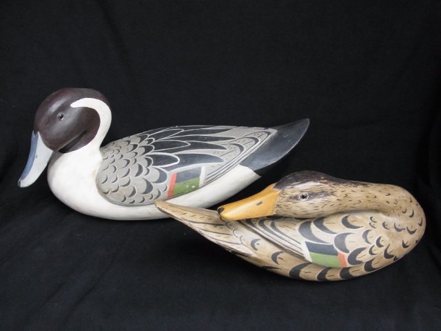 Pair R Zeringue Male Female Duck Hen Decoy CNX: Pair R Zeringue Male Female Duck Hen Decoy CNX These are wonderful and colorful. Beautiful detail. The artists name branded on both decoys on the bottom. From a local collection- source North USA or C