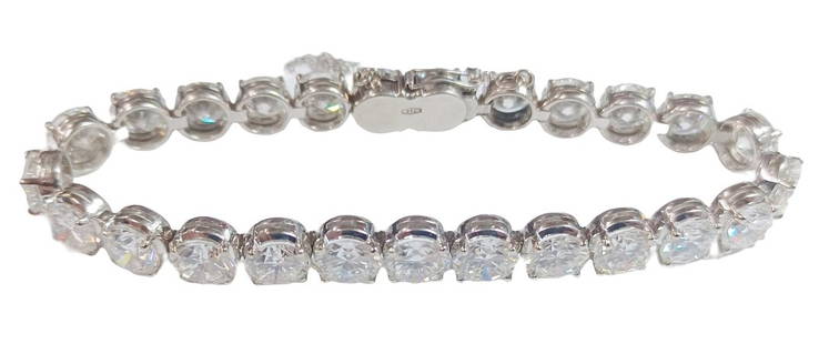Approx 27.0ctw 25 Stone Diamond 18K White Gold Tennis Bracelet: Title: Approx 27.0ctw 25 Stone Diamond 18K White Gold Tennis Bracelet Description:Approx 27ctw 25 Stone Diamond 18K White Gold Tennis Bracelet. We took 9 stones out at random to be GIA graded. One sto