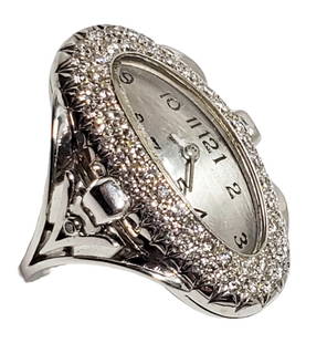 Rare Boucheron 18k White Gold Diamond Ladies Ring Watch: Described By:Michelle NFGDD 52305 Title:Rare Boucheron 18k White Gold Diamond Ladies Ring Watch Description: Rare Boucheron 18k White Gold Diamond Ladies Ring Watch. Approx. 1 ctw full cut round genui