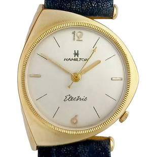 Hamilton Savitar 1961 Asymmetrical Arbib 14K Gold Vintage Mens Wrist Watch: Described By:Edison CNX 1485 C-7055 Title:Hamilton Savitar 1961 Asymmetrical Arbib 14K Gold Vintage Mens Wrist Watch Provenance:Introducing the Hamilton Electric wristwatch portion of the Saloff Colle