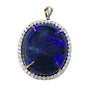 Approx 50ctw GIA Black Opal Natural No Treatment in Modern 18k White Gold Diamond Halo Mounting: Described by:Ayanna HFA Title:Approx 50ctw GIA Black Opal Natural No Treatment in Modern 18k White Gold Diamond Halo Mounting Description: Approx 50ctw GIA Black Opal Natural No Treatment in Modern 18