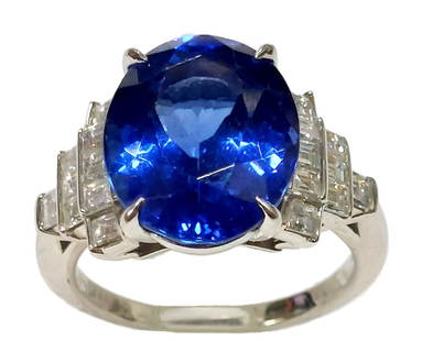 Tiffany & Co. 7.48ct Gem Quality Tanzanite 0.76ctw Square Cut Diamond Platinum Ladies Ring: Title: Tiffany & Co. 7.48ct Gem Quality Tanzanite 0.76ctw Square Cut Diamond Platinum Ladies Ring Description: Highly collectible 7.48ct gem quality tanzanite set in platinum with 0.76cts of F-G colo