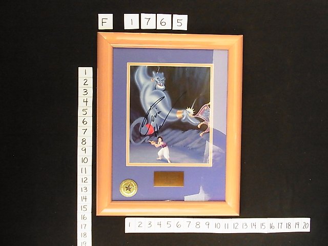 Signed Robin Williams Voice of Genie Aladdin Print: Title: Signed Robin Williams Voice of Genie Aladdin Print Walt Disney World Guaranteed Authentic Description: This is a hand signed print of Walt Disney animated character, Genie by the actor who vo