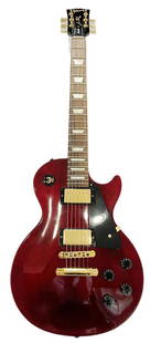 Gibson Les Paul Studio USA Wine Red Gold Pickups and Black Pickguard with Hard Case: Described By: Sam CNX 1527 7789 Title: Gibson Les Paul Studio USA Wine Red, Gold Pickups, Black Pickguard with Hard Case Hand-Made in USA Description: Absolutely stunning Les Paul Studio