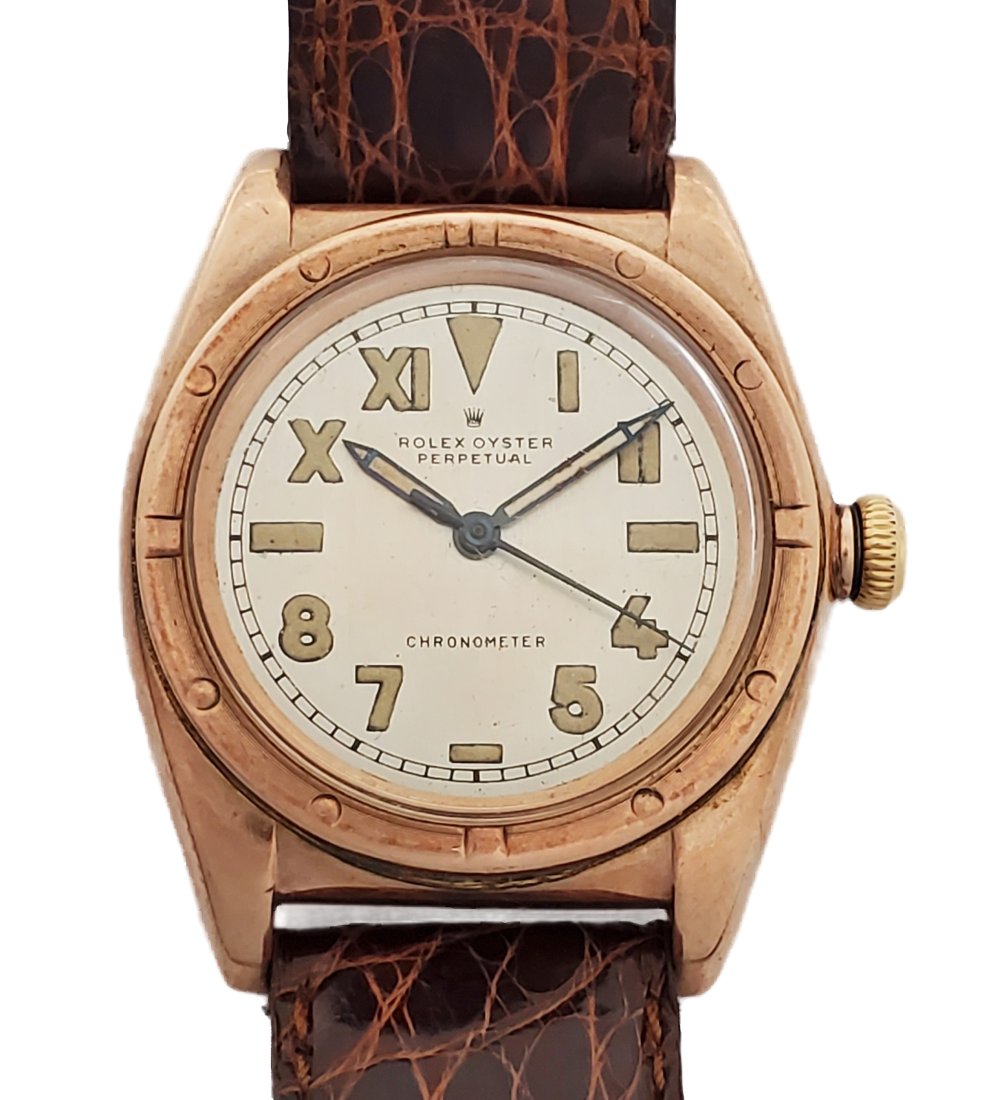 Rolex Red Gold Bubbleback Steel Back Vintage Mens Wrist Watch: Described By:Michelle NODDD 55533 Title:Rolex Red Gold Bubbleback Steel Back Vintage Mens Wrist Watch Description: Rolex Red Gold Bubbleback Steel Back Vintage Mens Wrist Watch Has a very desirable, s