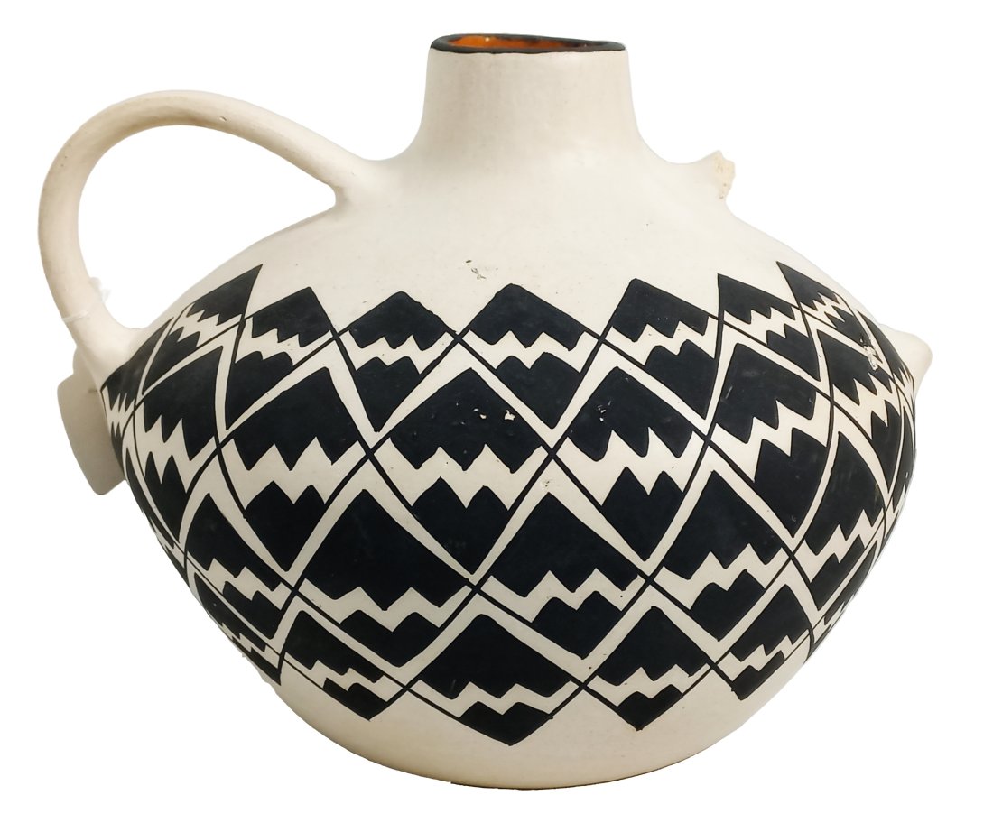 Acoma New Mexico Pueblo Signed Evening Star Handled Southwestern Clay Vase: Title:Acoma New Mexico Pueblo Signed Evening Star Handled Southwestern Clay Vase Description: Acoma New Mexico Pueblo Signed Evening Star Handled Southwestern Clay VaseBlack & white geometrical design