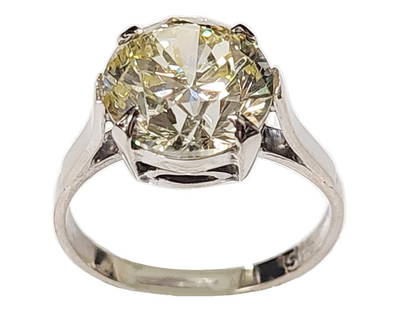 GIA 4.15ct VS1 Round Brilliant Diamond Solitaire 14k White Gold Vintage Engagement Ring w/ Report: Title: GIA 4.15ct VS1 Round Brilliant Diamond Solitaire 14k White Gold Vintage Engagement Ring w/ Report Description: An extremely fiery 4.15ct round brilliant cut diamond is mounted in a classic 14k