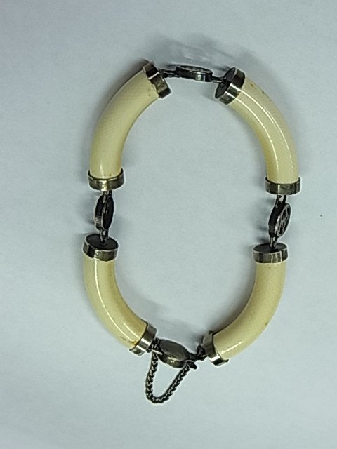 Antique Silver Mounted Chinese Ivory Medallion Bang: Antique Silver Mounted Chinese Ivory Medallion Bangle Bracelet Art Deco or Victorian Silver Plate Approx. Dimensions or Size: 6 ½” inner circumference, each ivory piece measures approx 36mm long, 8