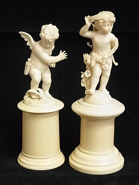 Pair Continental European Antique Grand Tour Classi: Pair Continental European Antique Grand Tour Classical Ivory Cherub Figural Carvings Greek or Italian Influence Perhaps After Old Master or Renaissance models Description: Circa Victorian late 19th