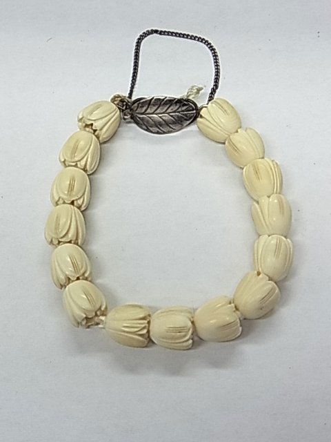 Antique Early Mings Honolulu Hawaii Hawaiian Carve: Description: Antique Early Mings Honolulu Hawaii Hawaiian Carved Bone or Ivory Silver Art Nouveau Deco Bracelet Leaf Clasp Beads. This Charming antique bracelet is fresh from a local estate. It is co