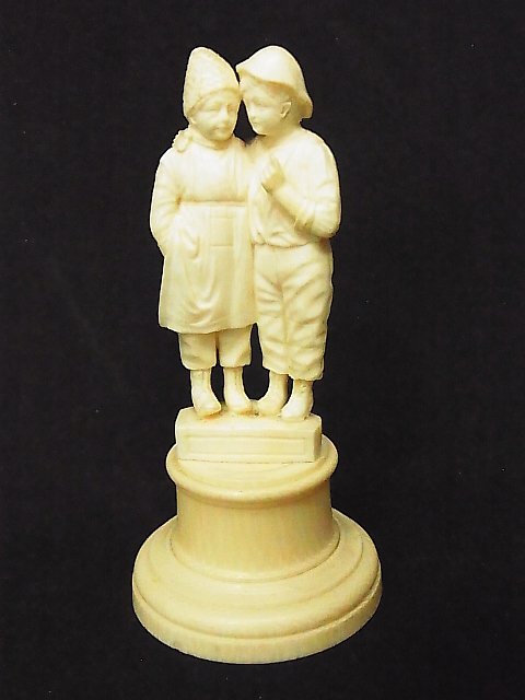 European Grand Tour Carved Ivory Miniature Figure: European Grand Tour Carved Ivory Miniature Figure Group Boy and Girl Statue Sculpture on Round Pedestal Plinth Base Possibly German Dutch French or Scandinavian Description: Charming miniature ivory s