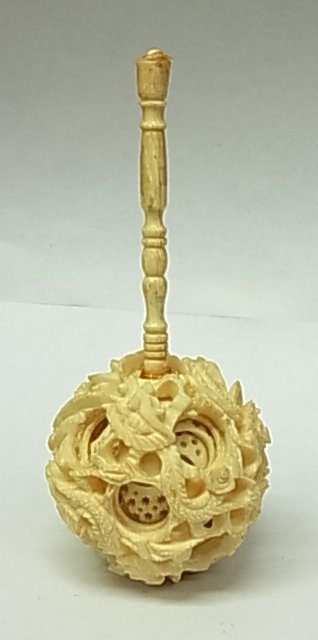 CNX 682 1965 Carved Ivory Puzzle Ball 5 or 6 Layer: Description: CNX 682 1965 Carved Ivory Puzzle Ball 5 or 6 Layers with Handle or Pedestal 2” Diameter 6 ½” Circumference Chinese Antique Approx. Dimensions or Size: 2” Diameter 6 ½” Circumfer